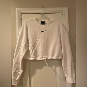 White Nike crewneck with adjustable waist.